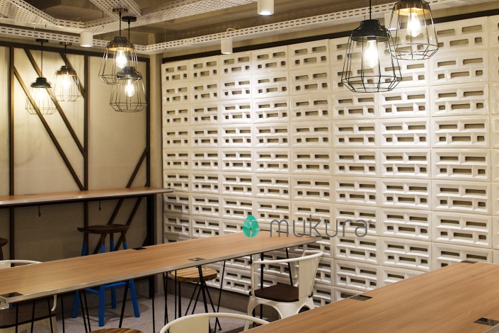 Accent wall from Roster Dashdot Plus in Self-Service area in Canteen District 8 SCBD with modern industrial interior 